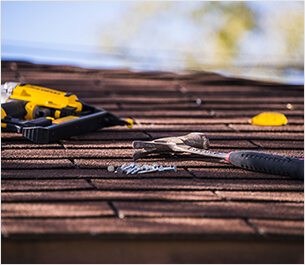 Tools on Roof - Toledo roofing contractor