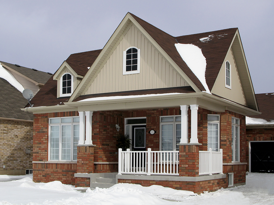 A small suburban house in winter.