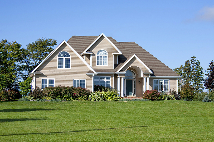 Exterior of a detached modern north American family home in a rural setting.