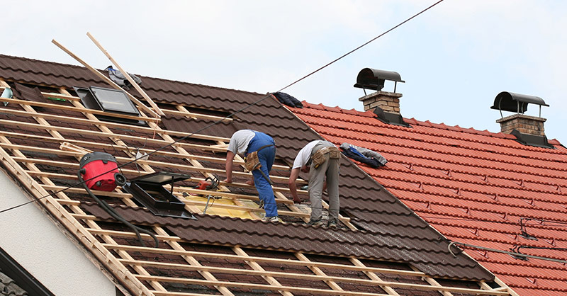 roofing contractors working on a roofing repair job