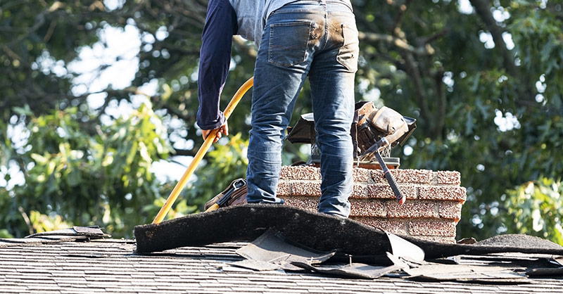 local roofing contractor works on a roof