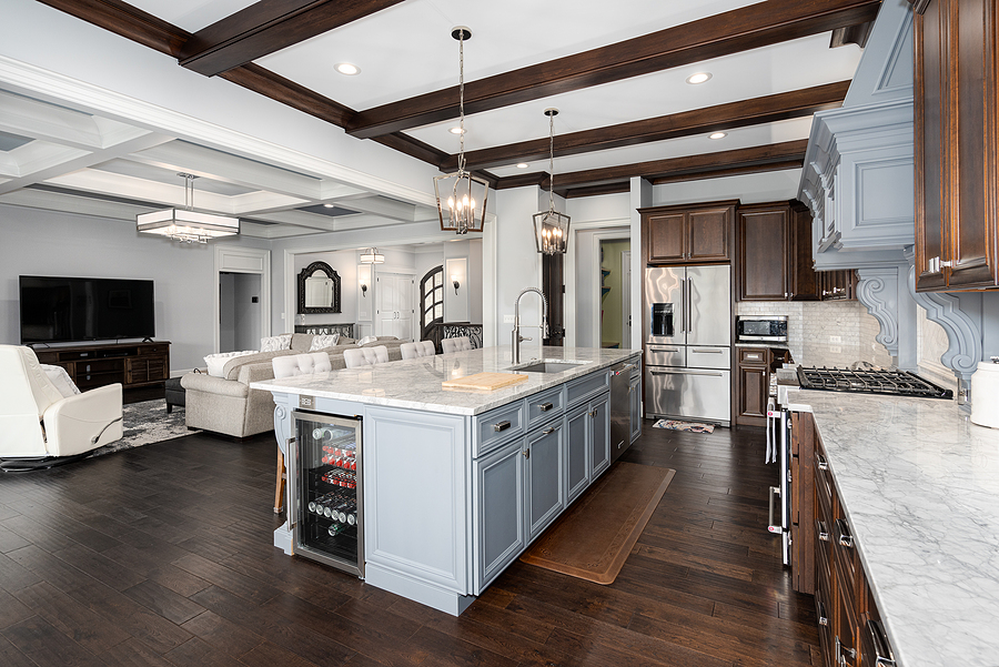 Newly renovated kitchen with large kitchen island full of storage.