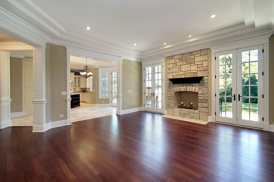 Recently renovated living room with beautiful new flooring and windows. 